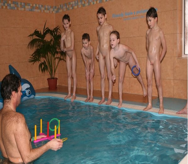 Naked nudists play in the pool [Pure naturism]