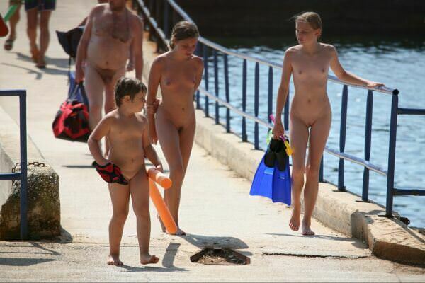 Family nudism - the road on a beach of nudists [Pure naturism]