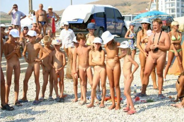 Meeting of nudists on a beach [Pure naturism]