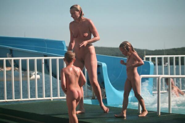 Family nudism - a roller coaster in an aquapark [Pure naturism]