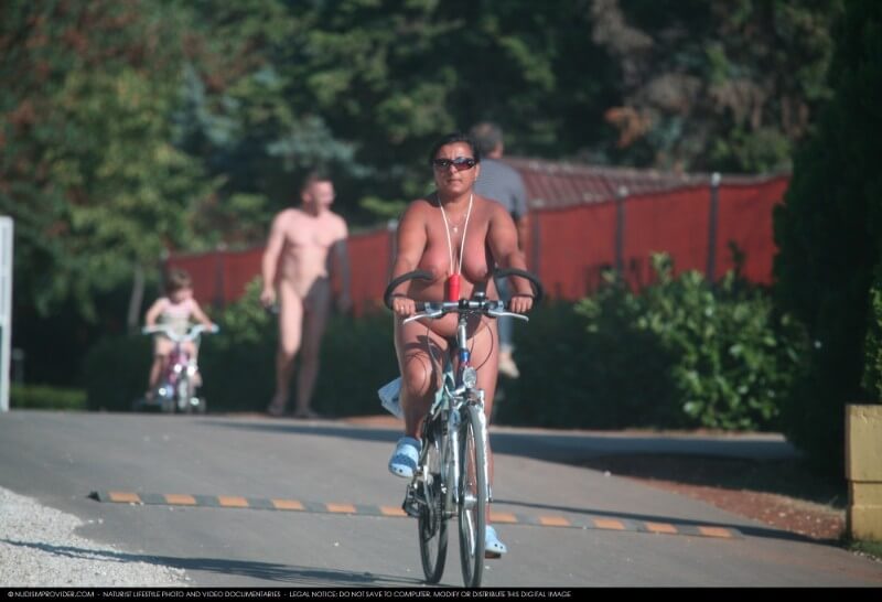 Naturists Road Biking pics - Getting rid of clothes