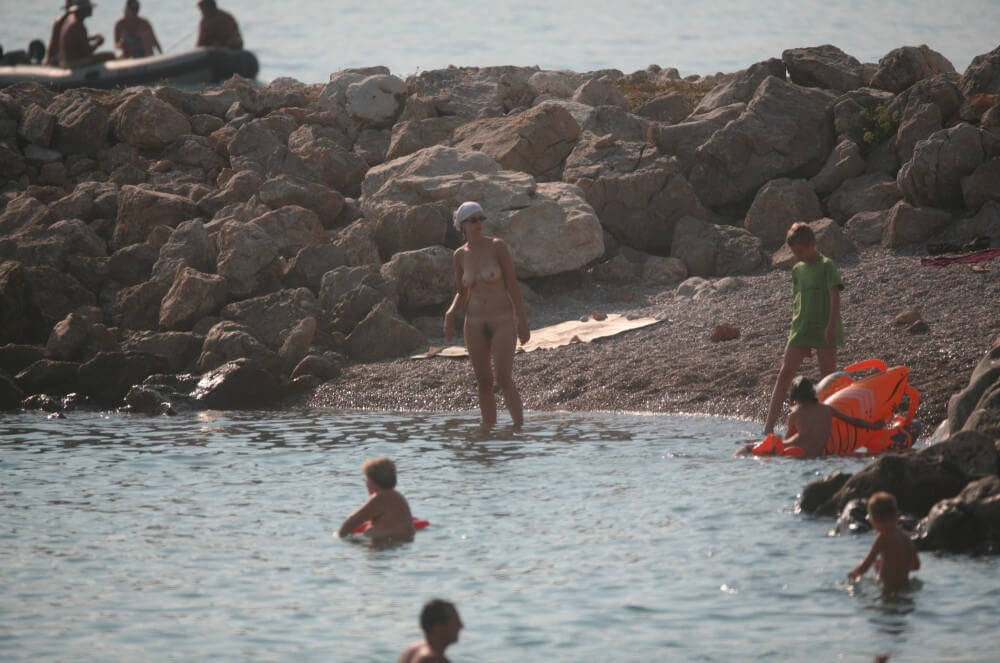FKK cove pyramid in waters - Freedom from clothing is an integral part of naturism