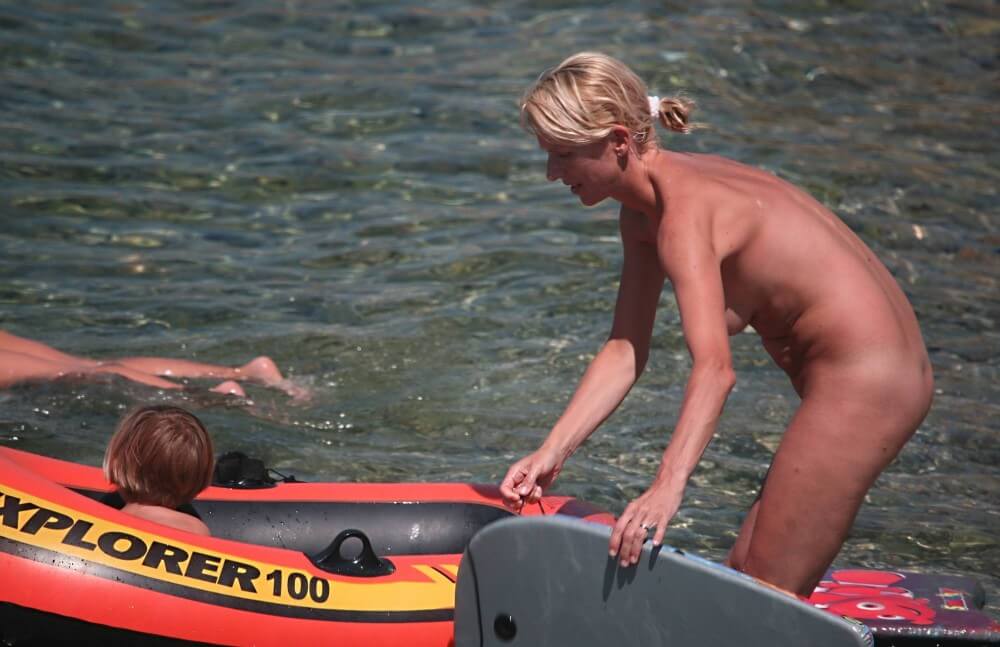 Red Boating for Two Nudists pics - The equality of body and spirit is an important idea in the practice of nudism and naturism
