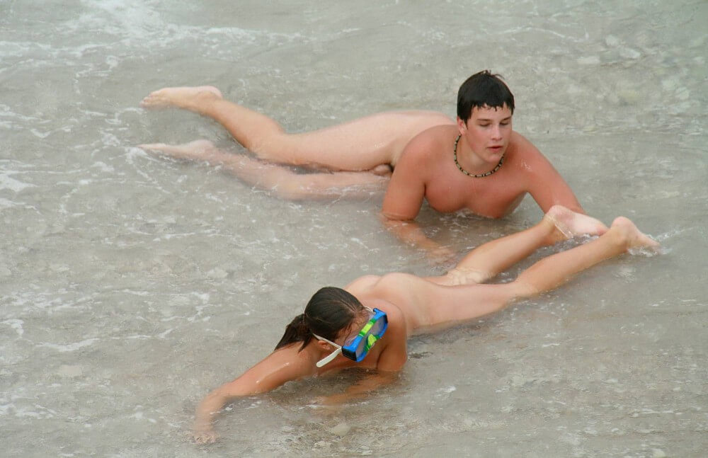 Wading In The Shallows pics - Living without unnecessary worries or restrictions is the essence of naturism