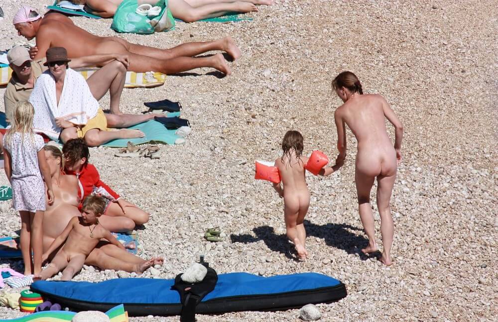 Orange Floaty Safety First Naturist pics - Naturism is not a cult