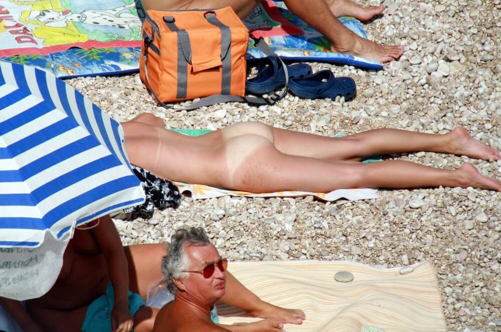 Naturists Beach Relaxation pics - The equality of body and spirit is an important idea in the practice of nudism and naturism